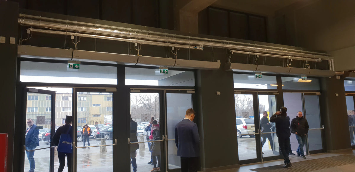 Rideau d'air chaud GUARD au dessus de porte de sortie 